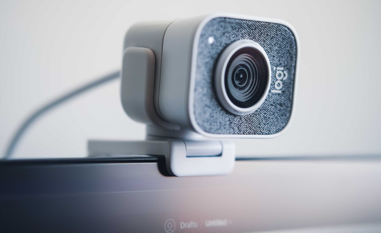 Laptop webcam closeup, photographed for a technology article.