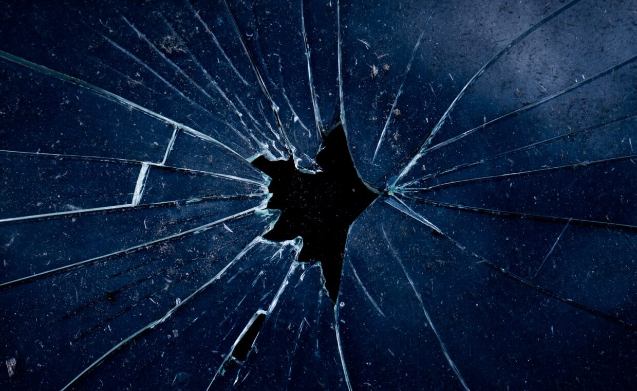 Cracked screen repair, photographed for a technology article.