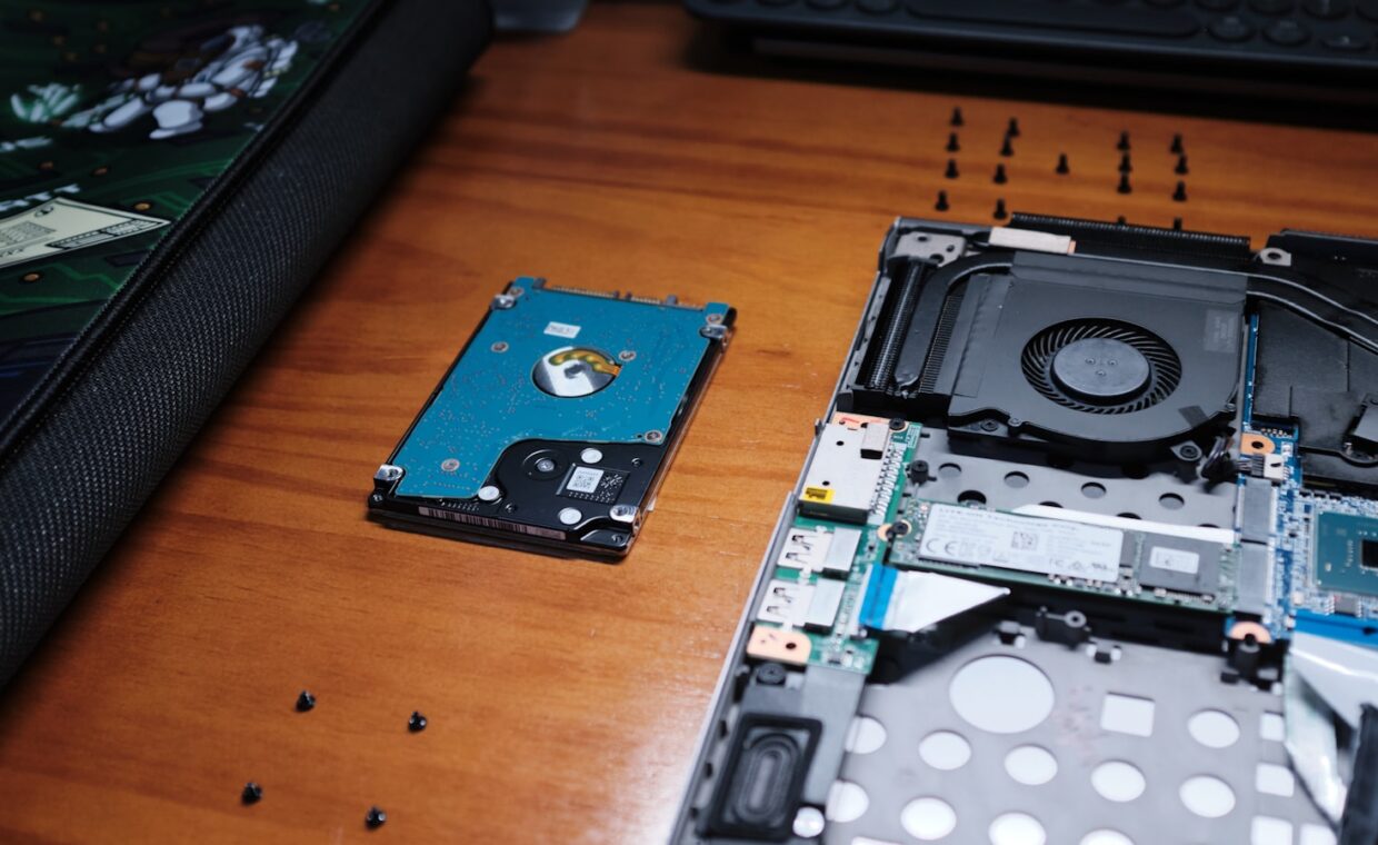 Ssd install laptop, photographed for a technology article.