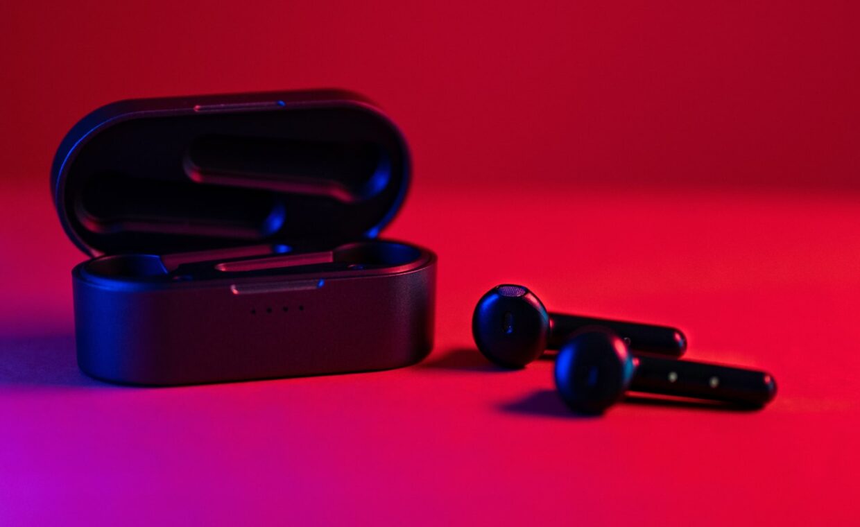 Bluetooth earbuds case, photographed for a technology article.