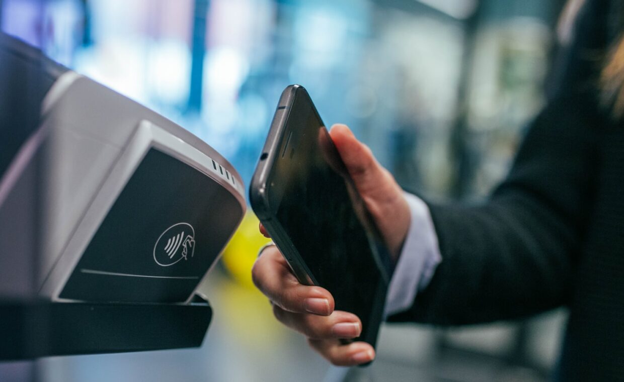Phone tap payment, photographed for a technology article.