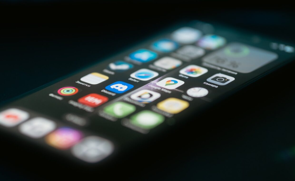 Phone dark mode, photographed for a technology article.
