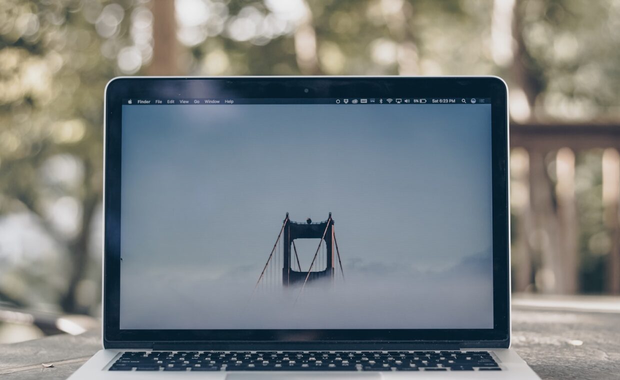 Laptop screen reflection, photographed for a technology article.
